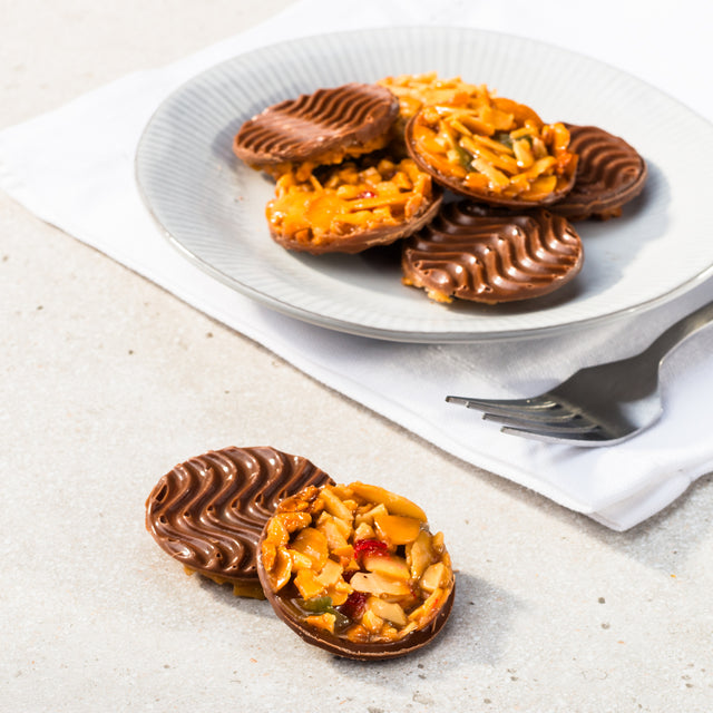 Small chocolate florentines on a plate