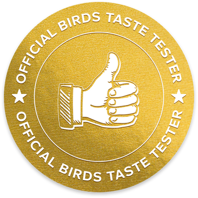 Gold badge with a hand giving a thumbs up and text 'Official Birds Taste Tester'